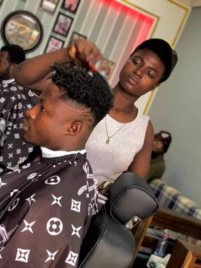 Meet Adwoa Pee, a beautiful female barber in Ghana trending on social media